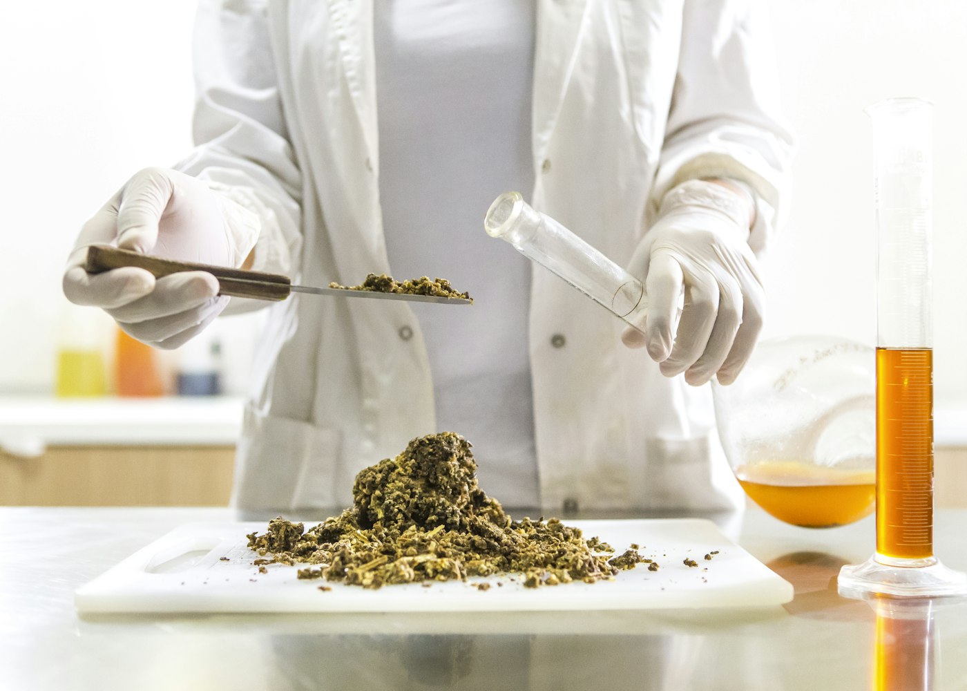 A technician preparing a laboratory sample for testing
